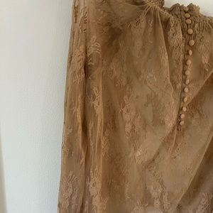 Sheer top with floral design